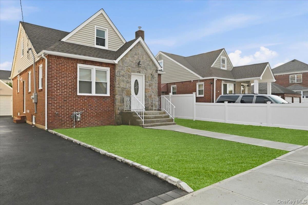 Exterior, Facade, Brick Facade, Cape Cod