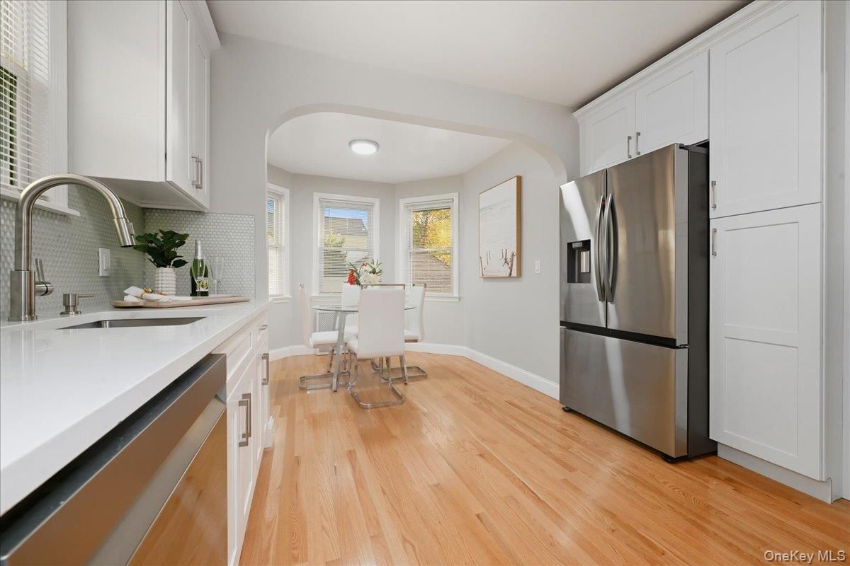 Dining room, Interior, Kitchen, Recessed Lighting, Stainless Steel Appliances, Wood Texture Flooring