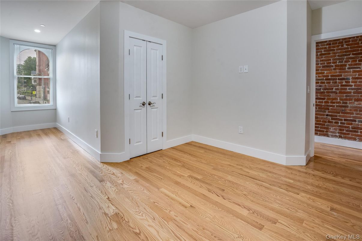 Empty room, Interior, Recessed Lighting, Stone Walls, Wood Texture Flooring