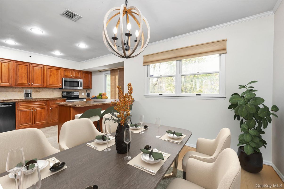 Chandelier, Dining room, Interior, Kitchen, Recessed Lighting, Stainless Steel Appliances, Wood Texture Flooring