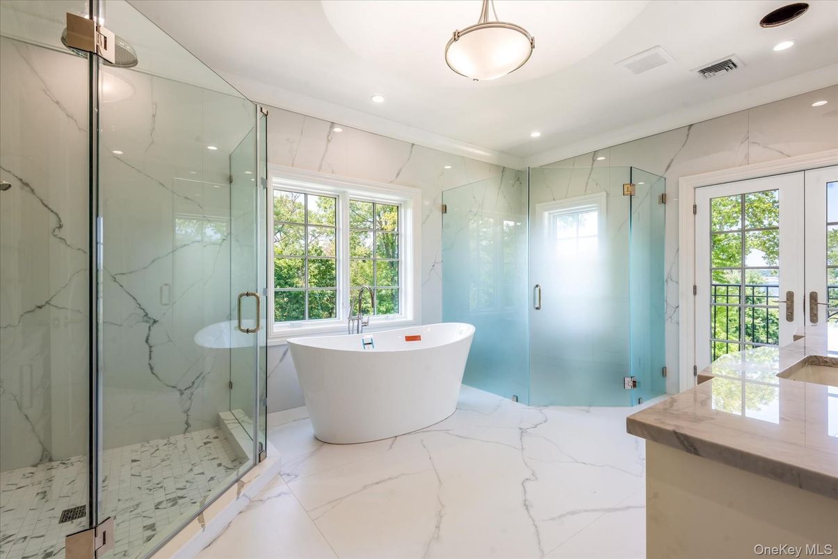 Bathroom, Free Standing Baths, Glass Shower, Interior, Marble, Marble Walls, Recessed Lighting