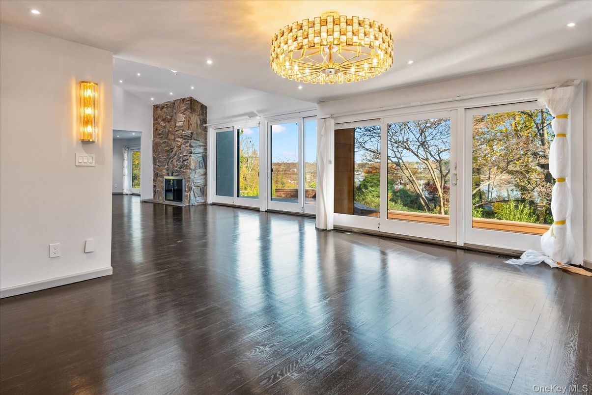 Chandelier, Empty room, Fireplace, Interior, Recessed Lighting, Wood Texture Flooring
