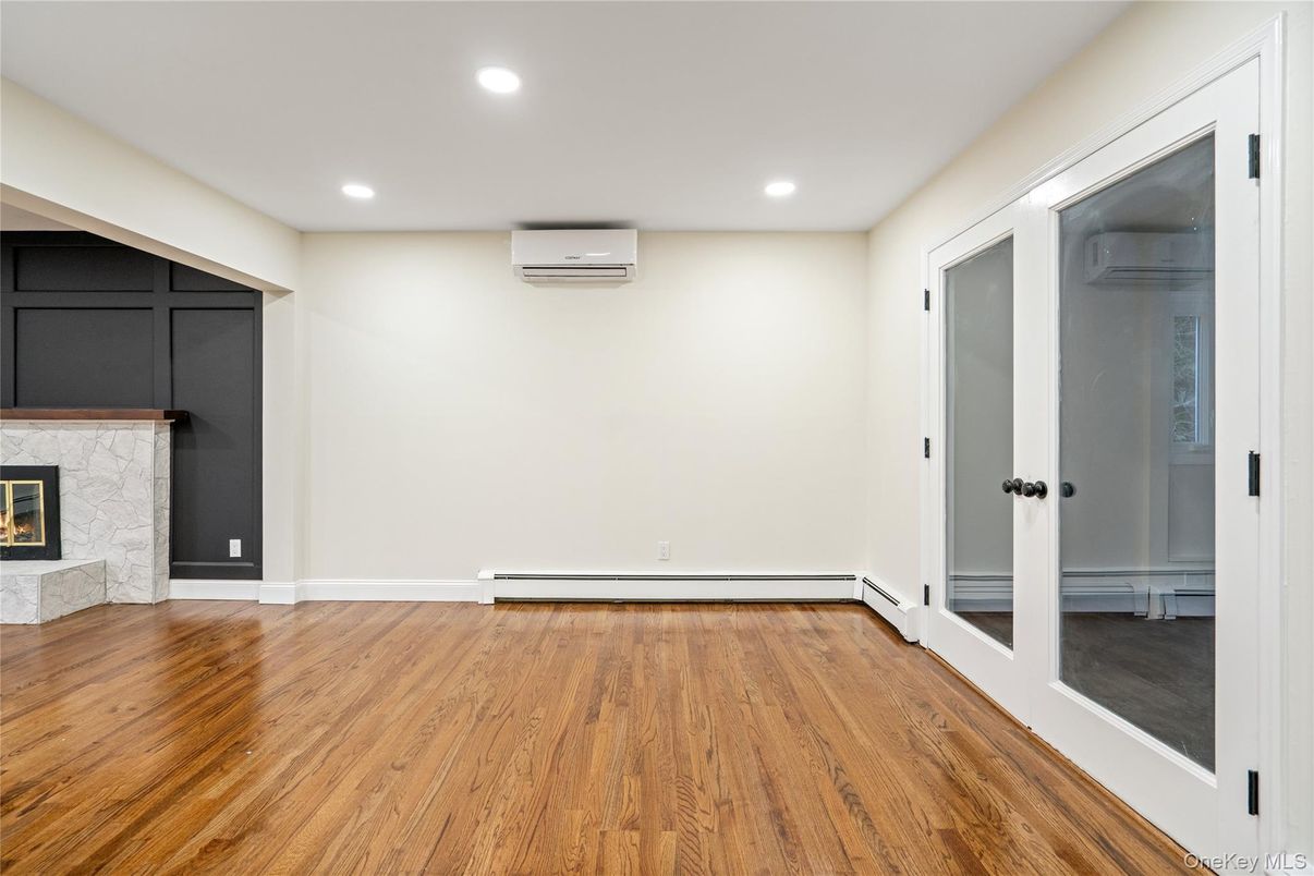 Empty room, Fireplace, Interior, Recessed Lighting, Wood Texture Flooring
