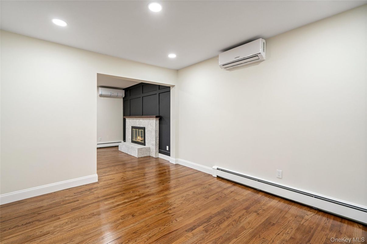 Empty room, Fireplace, Interior, Recessed Lighting, Wood Texture Flooring