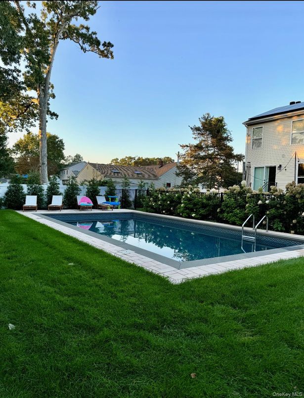 Exterior, Pool, Solar Panels