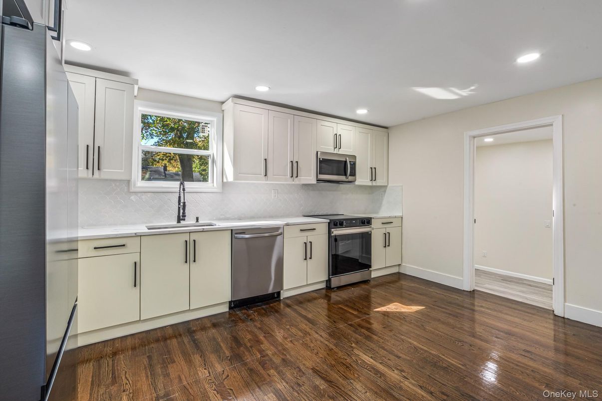 Interior, Kitchen, Recessed Lighting, Stainless Steel Appliances, Wood Texture Flooring