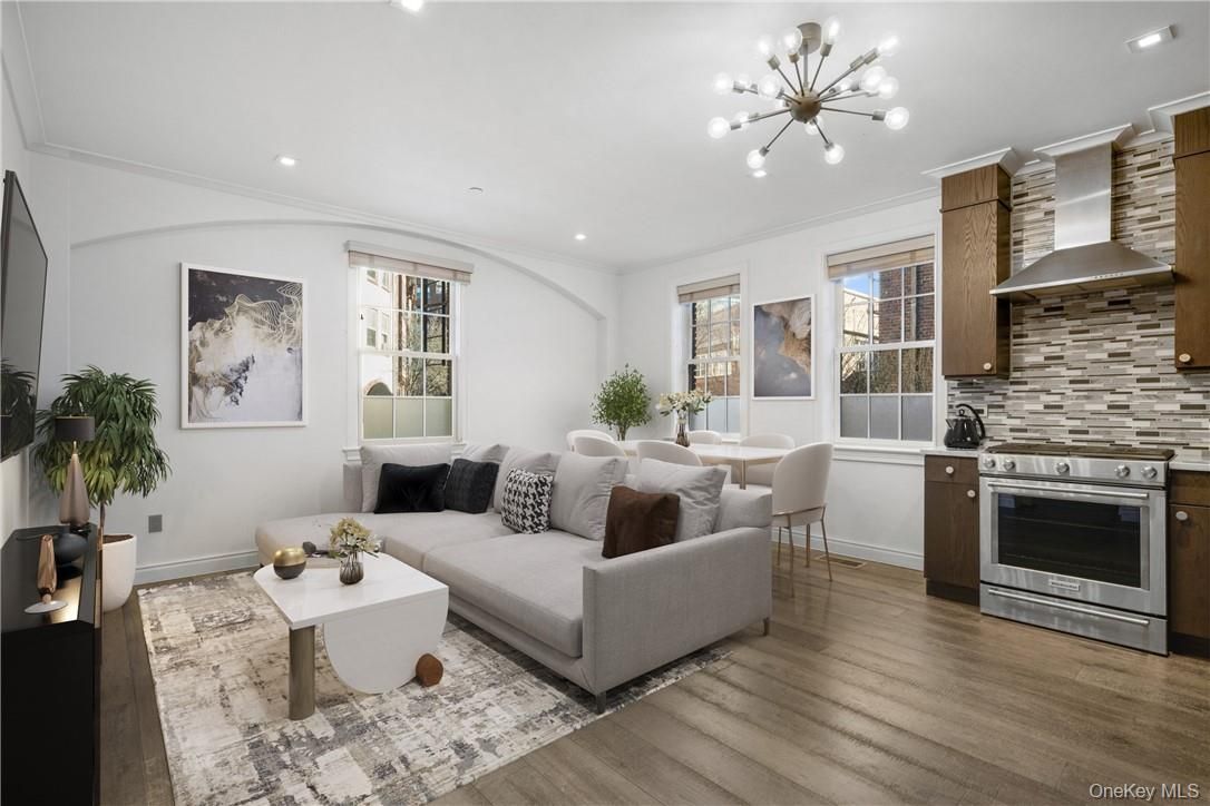 Dining room, Interior, Kitchen, Living room, Pendant Lights, Recessed Lighting, Stainless Steel Appliances, Wood Texture Flooring