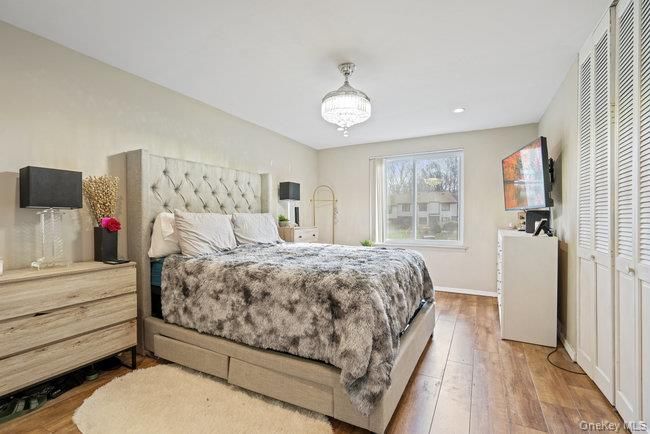 Bedroom, Chandelier, Interior, Recessed Lighting, Wood Texture Flooring