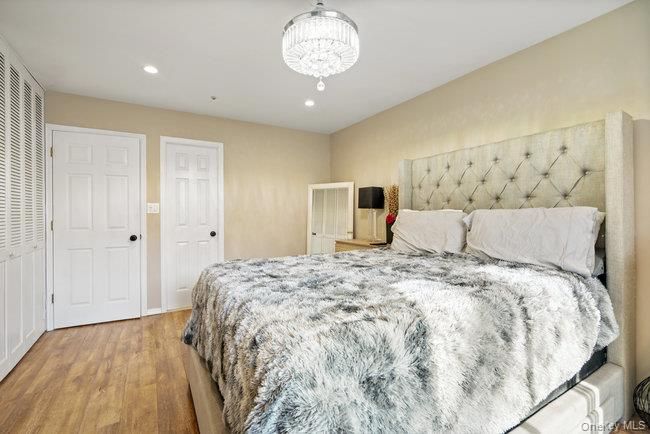 Bedroom, Chandelier, Interior, Recessed Lighting, Wood Texture Flooring