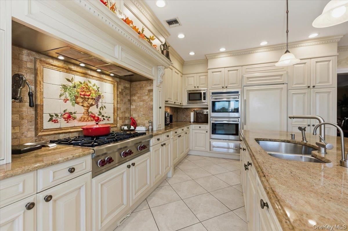 Interior, Kitchen, Pendant Lights, Recessed Lighting, Stainless Steel Appliances, Stone Walls