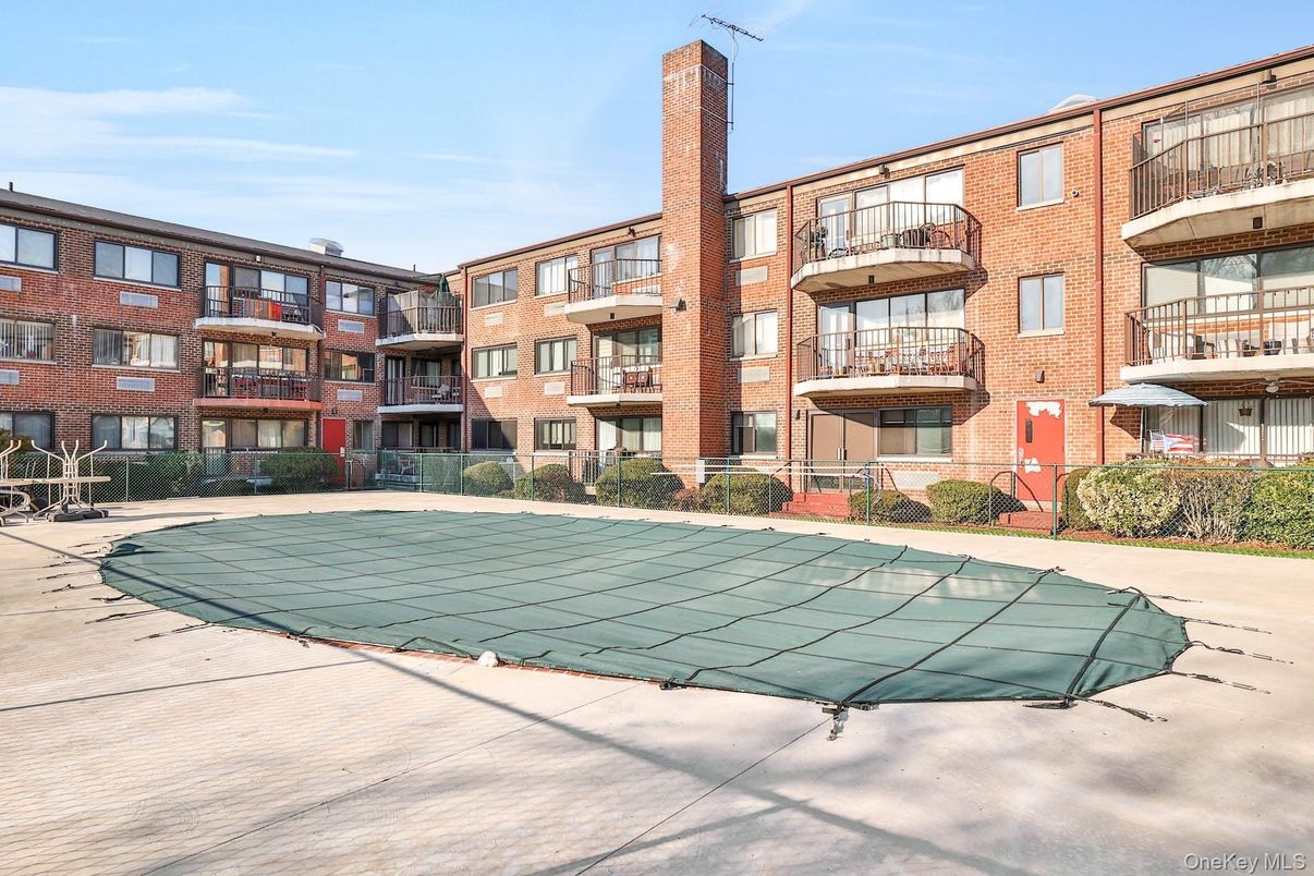 Exterior, Facade, Brick Facade, Condo Building