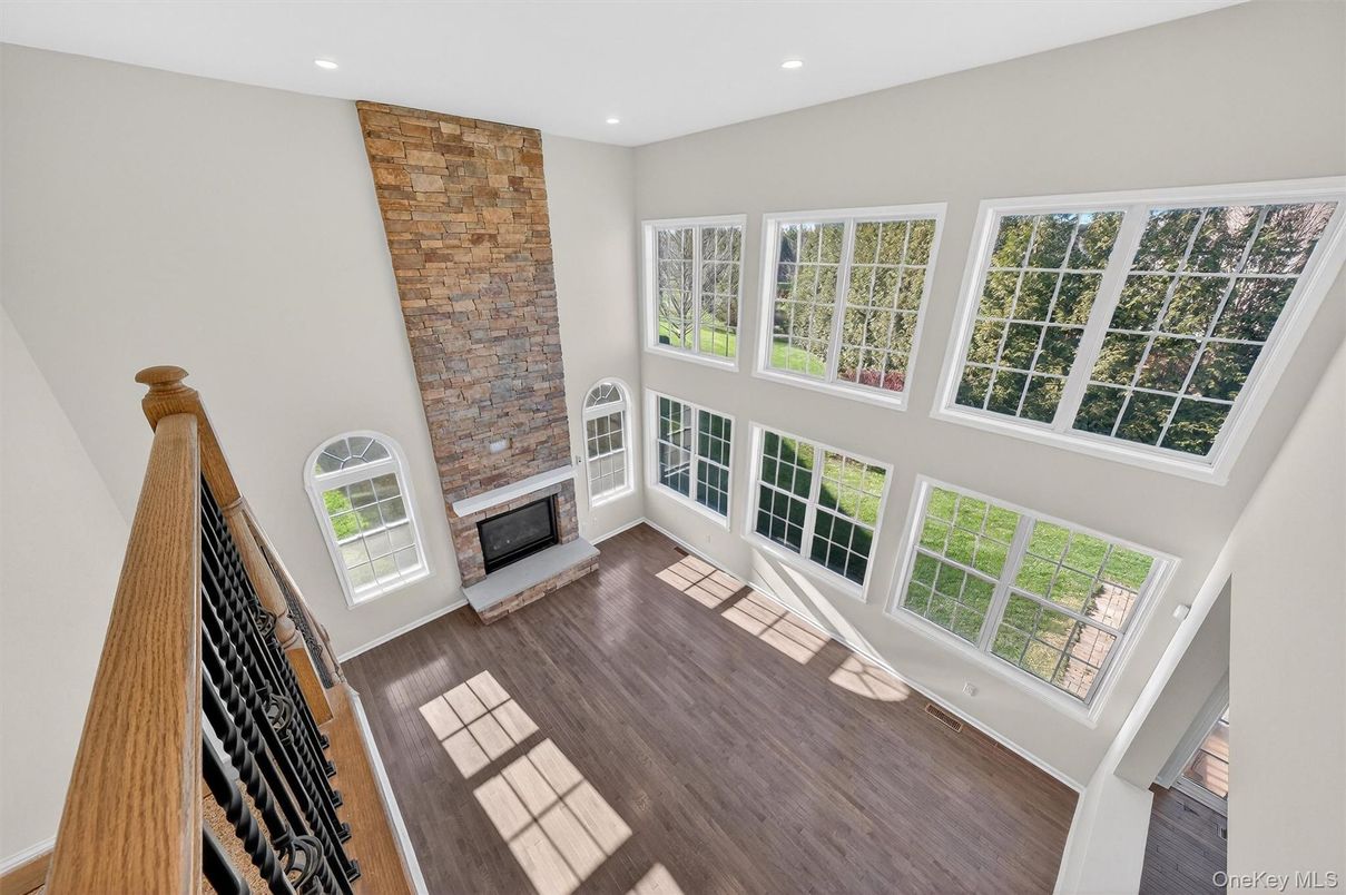 Fireplace, Interior, Recessed Lighting, Stone Walls, Wood Texture Flooring