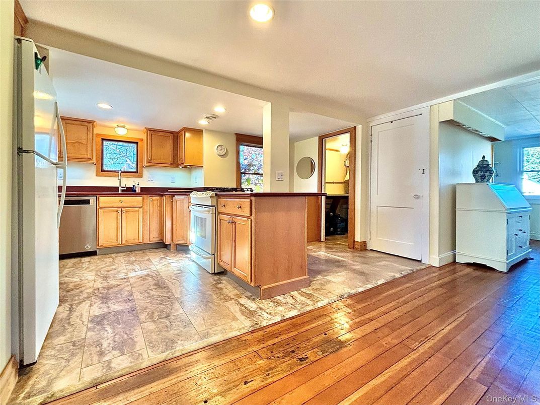 Interior, Kitchen, Recessed Lighting, Stainless Steel Appliances, Washer, Wood Texture Flooring