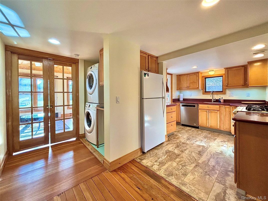 Interior, Kitchen, Recessed Lighting, Washer, Wood Texture Flooring