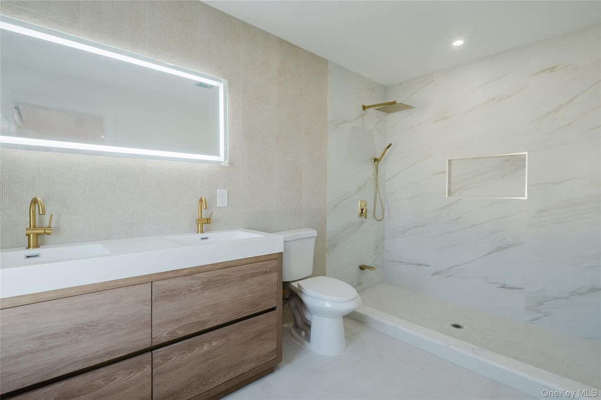 Bathroom, Dual Sink Vanities, Interior, Marble Walls, Recessed Lighting
