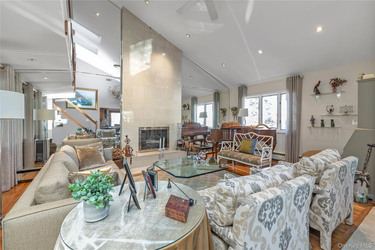 Fireplace, Interior, Living room, Piano, Recessed Lighting, Wood Texture Flooring