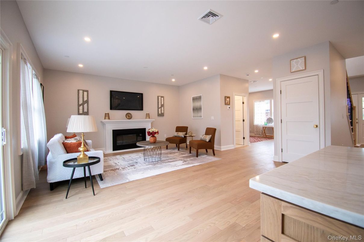 Fireplace, Interior, Living room, Recessed Lighting, Wood Texture Flooring