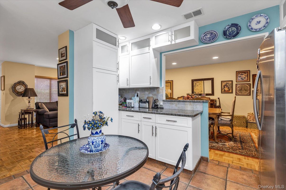Dining room, Interior, Kitchen, Recessed Lighting, Stainless Steel Appliances, Wood Texture Flooring