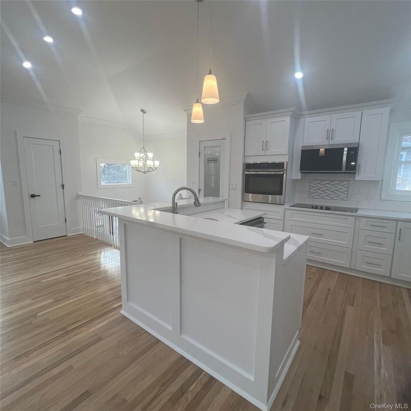 Chandelier, Interior, Kitchen, Pendant Lights, Recessed Lighting, Stainless Steel Appliances, Wood Texture Flooring