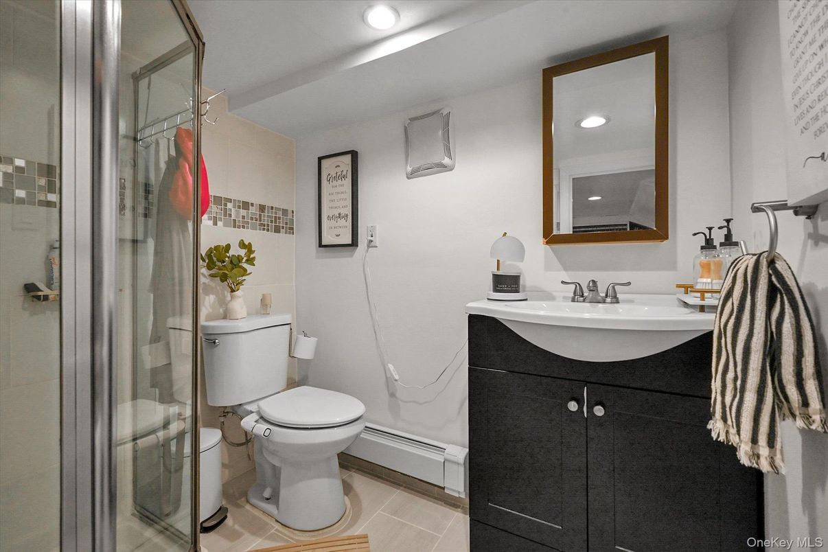 Bathroom, Glass Shower, Interior, Recessed Lighting, Wood Texture Flooring