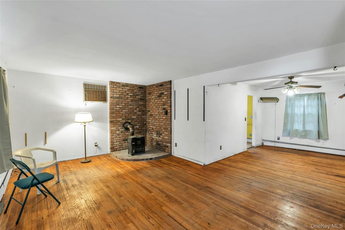 Empty room, Fireplace, Interior, Stone Walls, Wood Texture Flooring