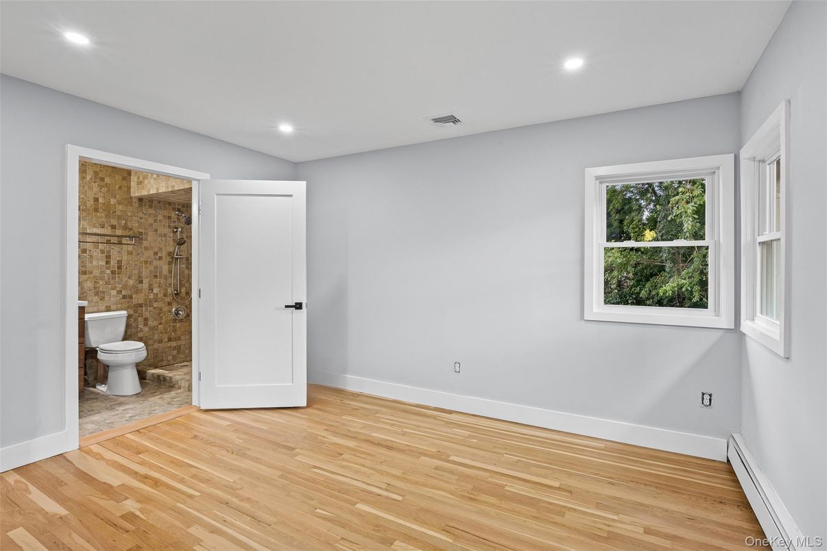 Bathroom, Empty room, Glass Shower, Interior, Recessed Lighting, Wood Texture Flooring