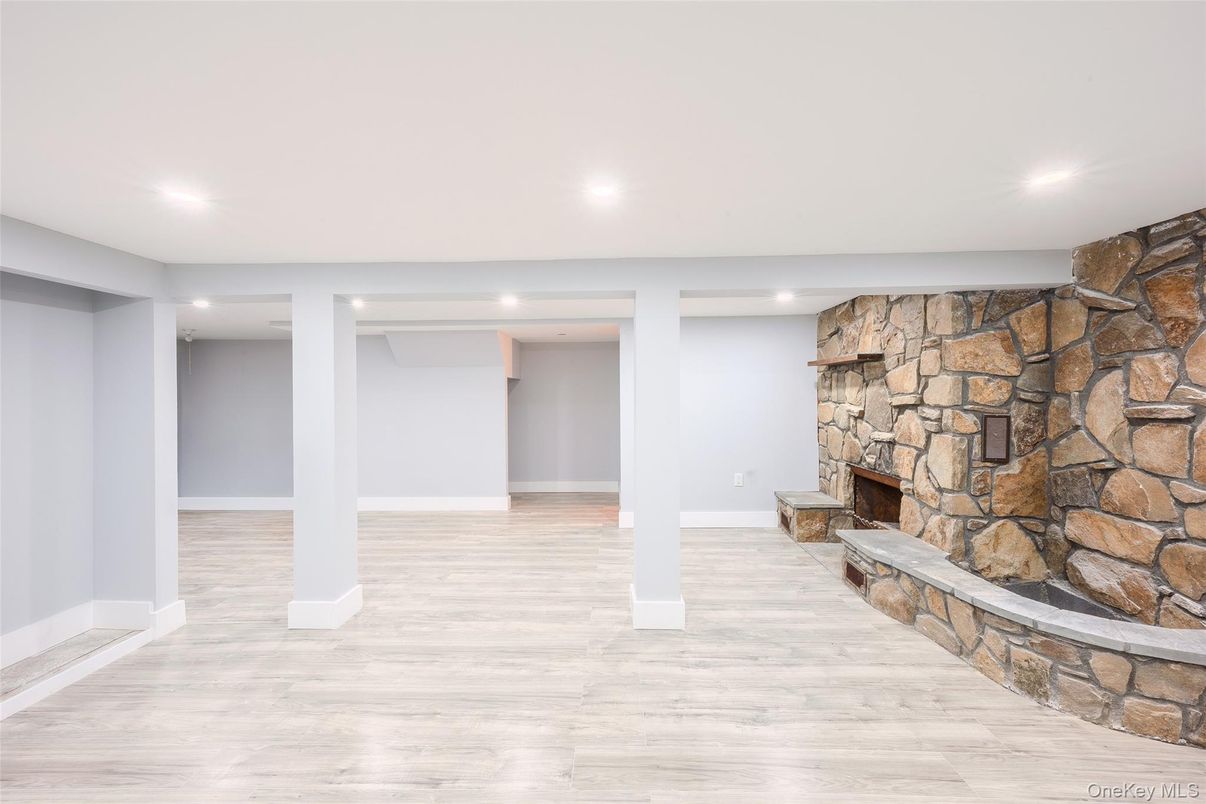 Fireplace, Interior, Recessed Lighting, Stone Walls, Wood Texture Flooring