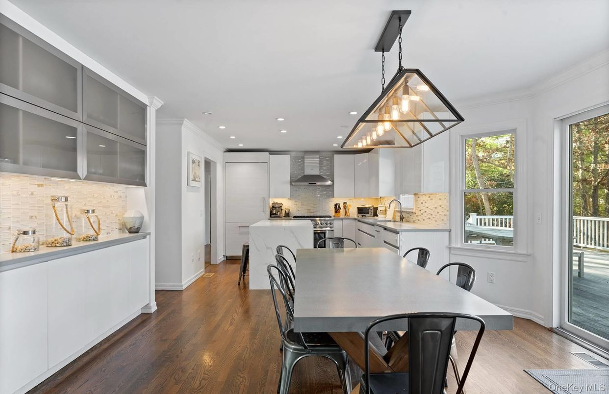 Dining room, Interior, Kitchen, Pendant Lights, Recessed Lighting, Stainless Steel Appliances, Wood Texture Flooring