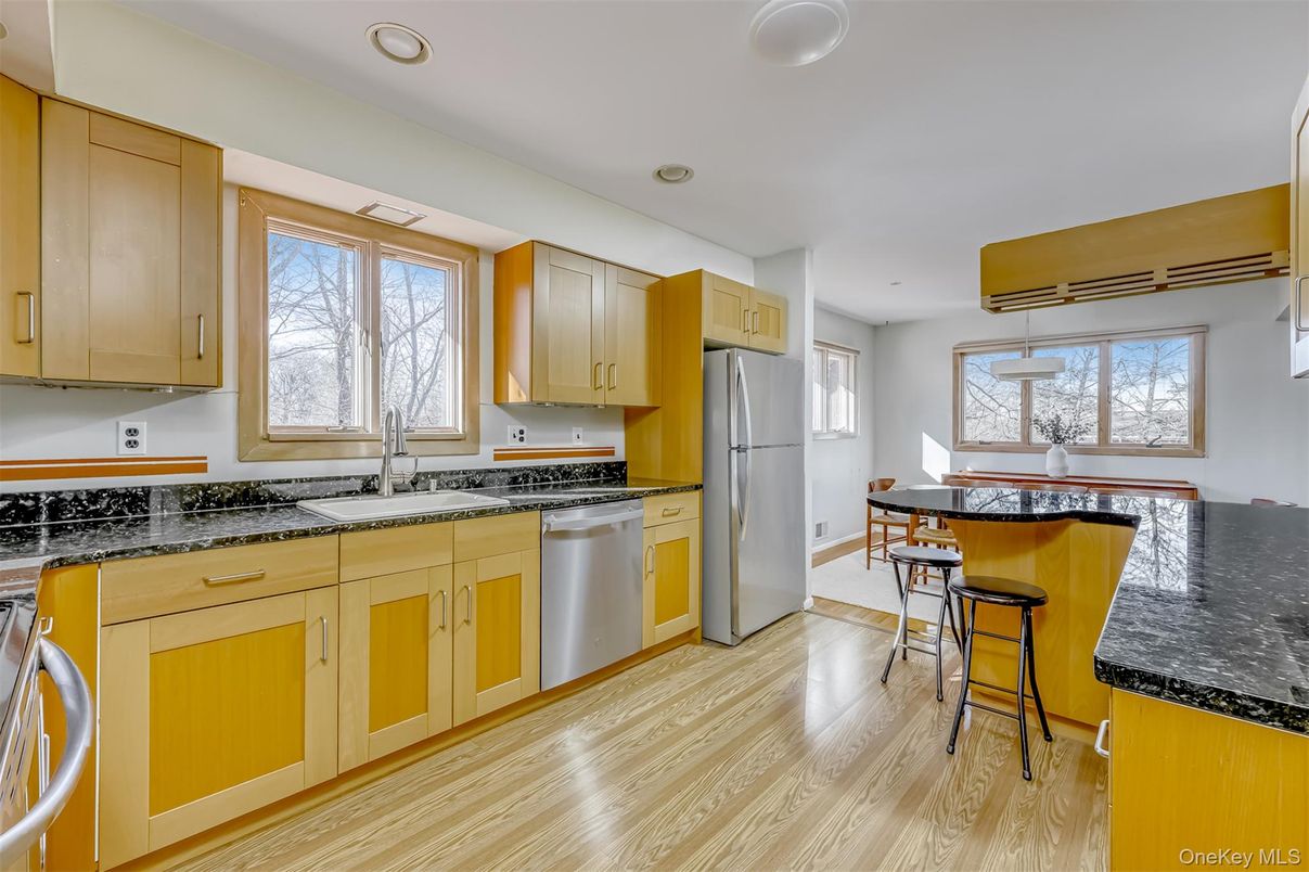 Dining room, Interior, Kitchen, Recessed Lighting, Stainless Steel Appliances, Wood Texture Flooring