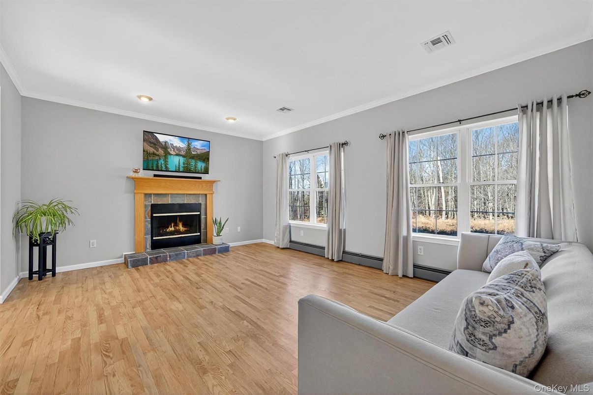 Fireplace, Interior, Living room, Recessed Lighting, Wood Texture Flooring