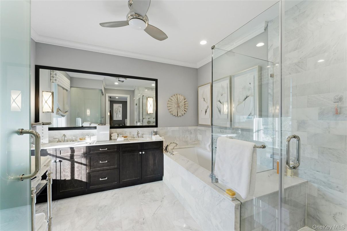 Bathroom, Dual Sink Vanities, Glass Shower, Interior, Marble, Marble Walls, Recessed Lighting