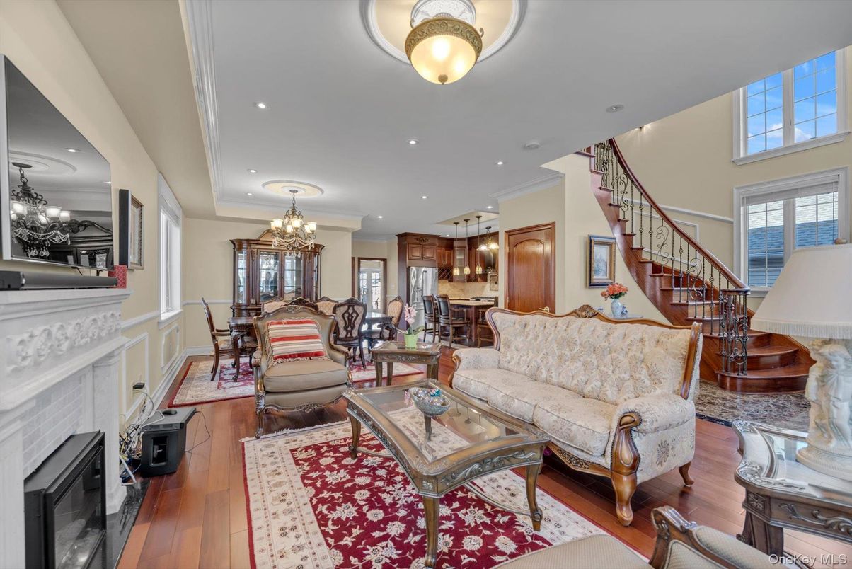 Chandelier, Dining room, Fireplace, Interior, Kitchen, Living room, Pendant Lights, Recessed Lighting, Wood Texture Flooring