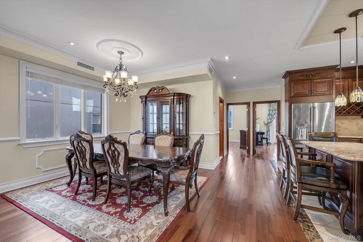 Chandelier, Dining room, Interior, Kitchen, Recessed Lighting, Stainless Steel Appliances, Wood Texture Flooring