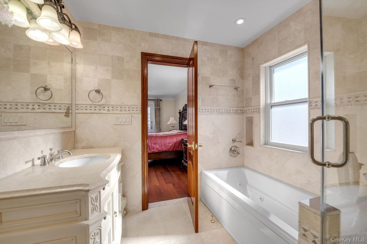 Bathroom, Bedroom, Dual Sink Vanities, Interior, Recessed Lighting, Wood Texture Flooring