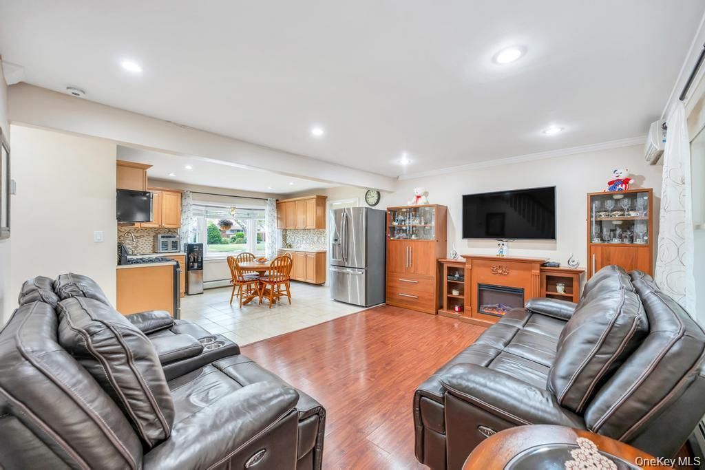 Home Theatre Room, Dining room, Interior, Kitchen, Living room, Recessed Lighting, Stainless Steel Appliances, Wood Texture Flooring