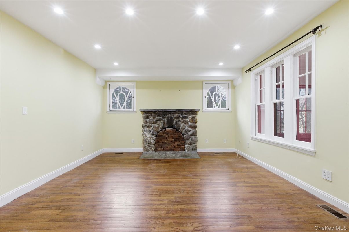 Empty room, Fireplace, Interior, Recessed Lighting, Wood Texture Flooring