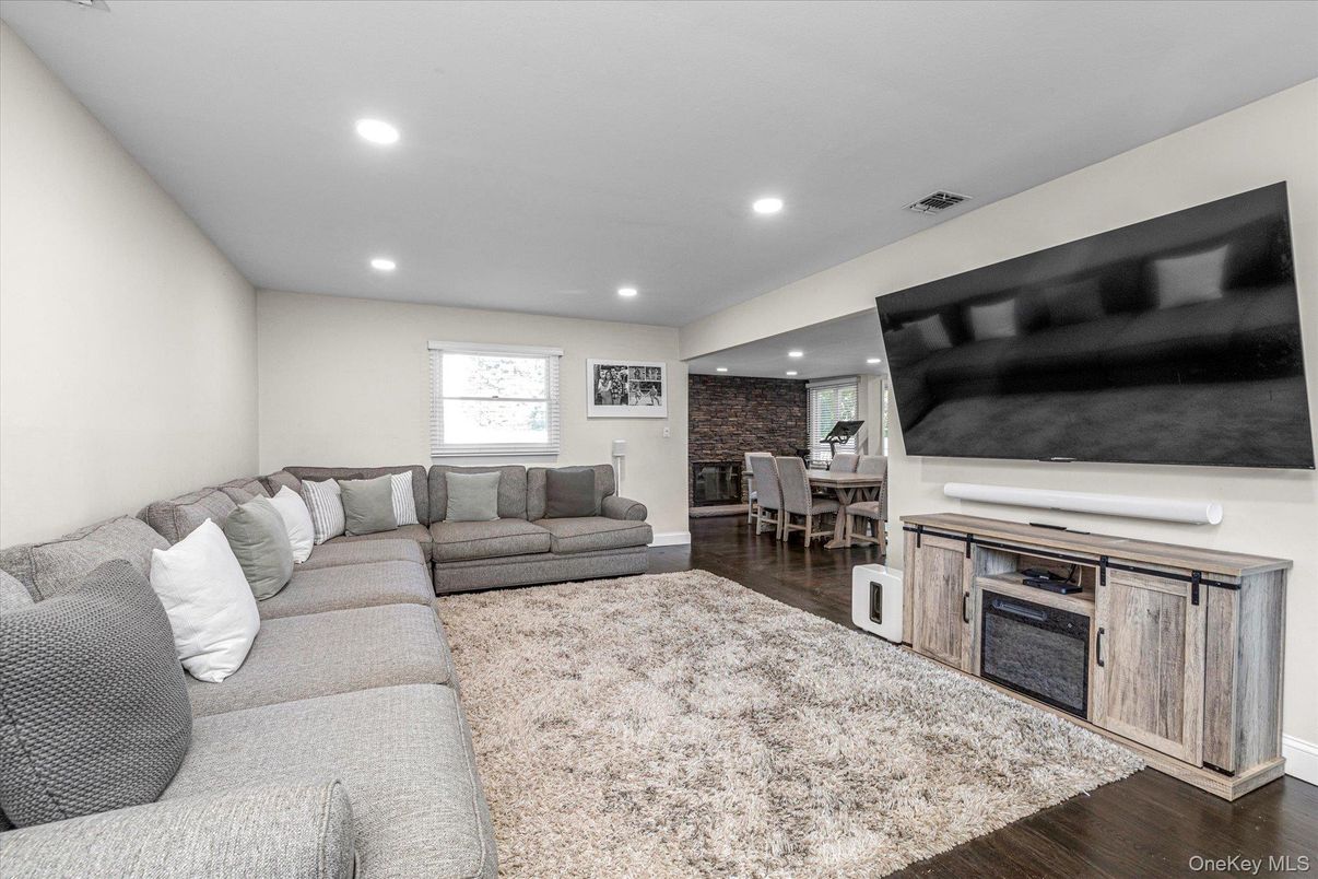 Dining room, Interior, Living room, Recessed Lighting, Stone Walls, Wood Texture Flooring