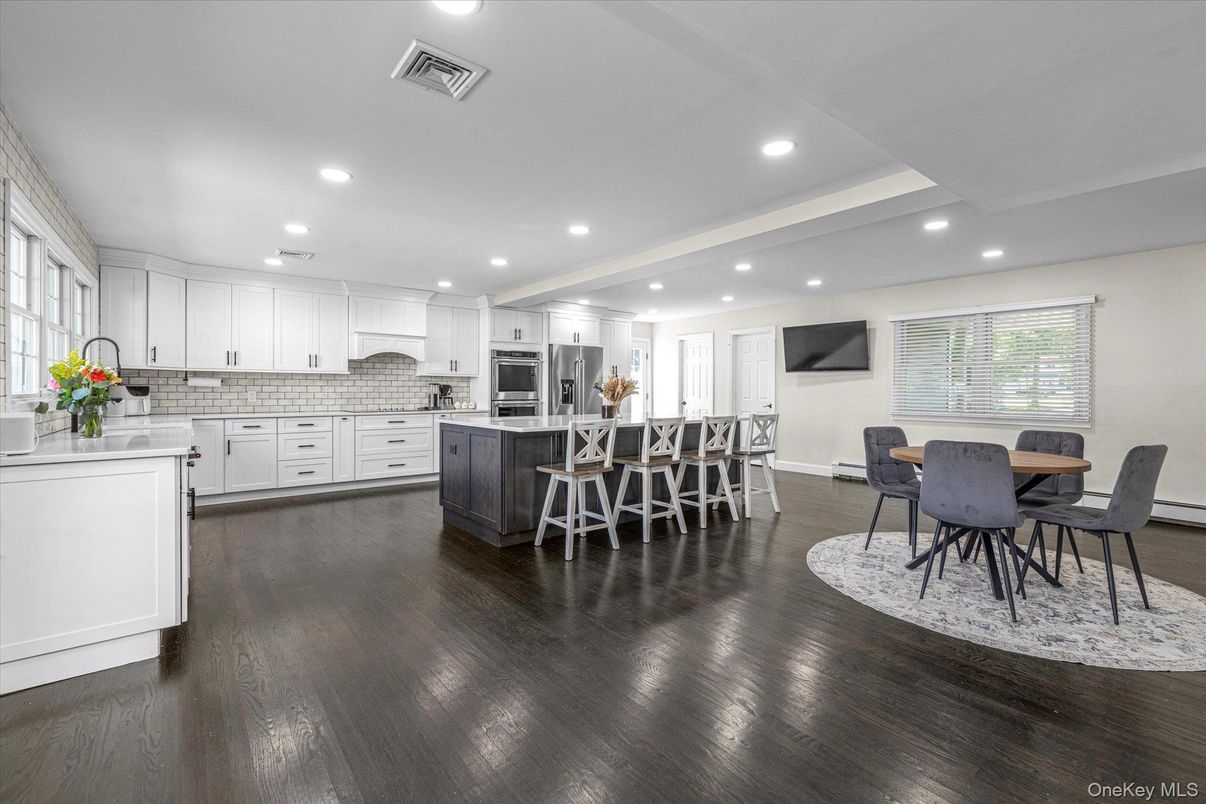 Dining room, Interior, Kitchen, Recessed Lighting, Stainless Steel Appliances, Wood Texture Flooring