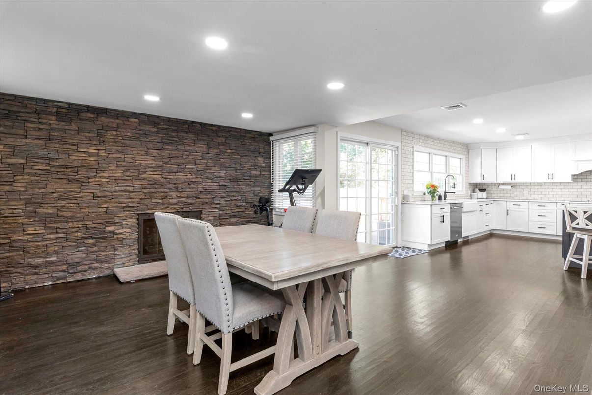 Dining room, Fitness Equipment, Interior, Kitchen, Recessed Lighting, Stone Walls, Wood Texture Flooring