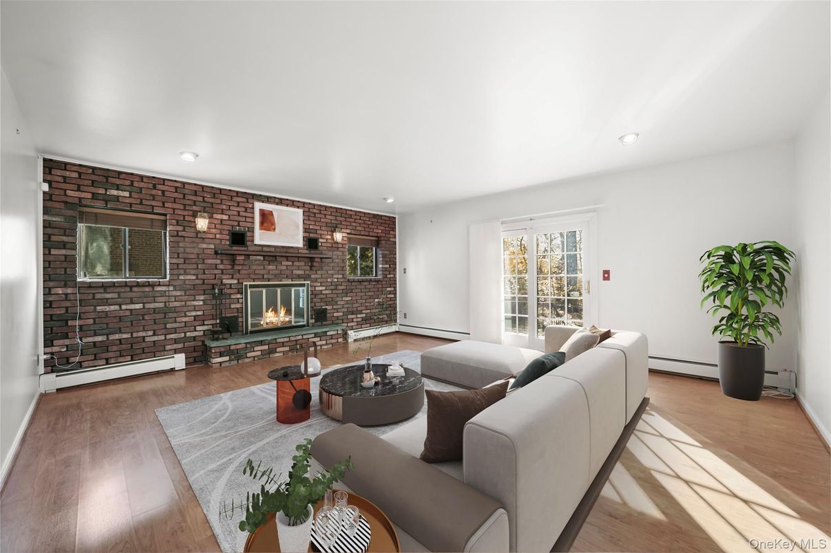 Fireplace, Interior, Living room, Recessed Lighting, Stone Walls, Wood Texture Flooring