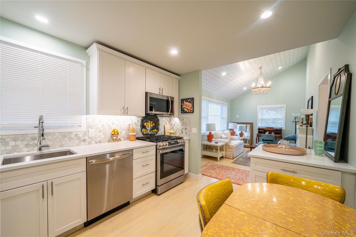 Chandelier, Interior, Kitchen, Living room, Recessed Lighting, Stainless Steel Appliances, Wood Texture Flooring