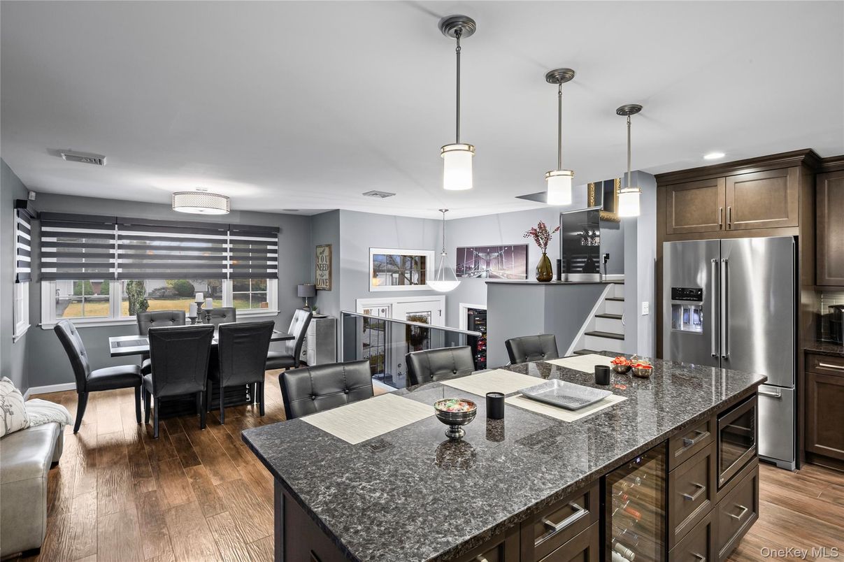 Dining room, Interior, Kitchen, Pendant Lights, Recessed Lighting, Stainless Steel Appliances, Wood Texture Flooring
