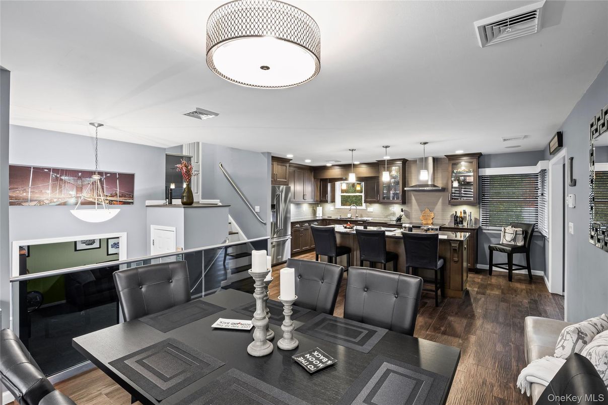 Dining room, Interior, Kitchen, Pendant Lights, Recessed Lighting, Stainless Steel Appliances, Wood Texture Flooring