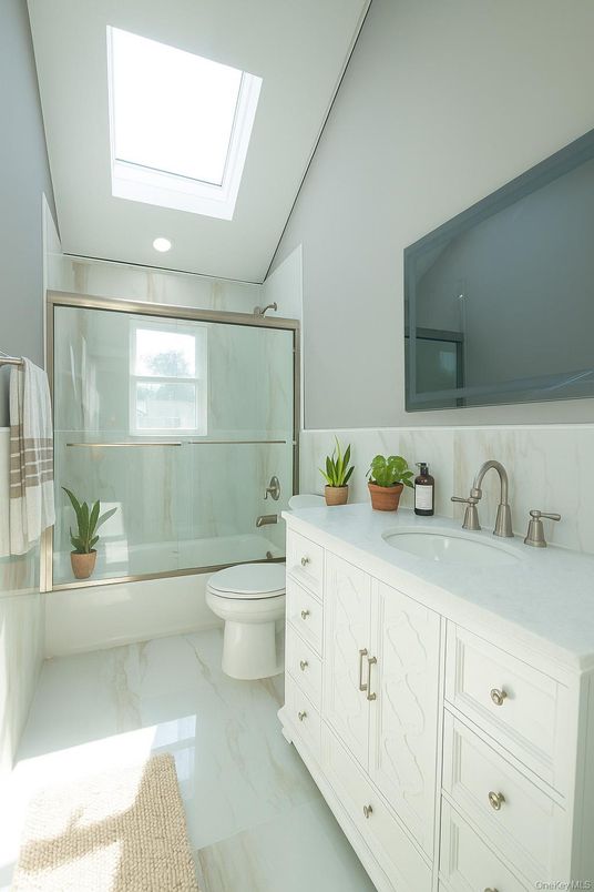 Bathroom, Dual Sink Vanities, Glass Shower, Interior, Marble, Recessed Lighting