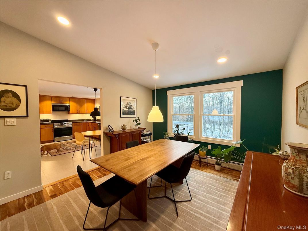 Dining room, Interior, Kitchen, Pendant Lights, Recessed Lighting, Stainless Steel Appliances, Wood Texture Flooring