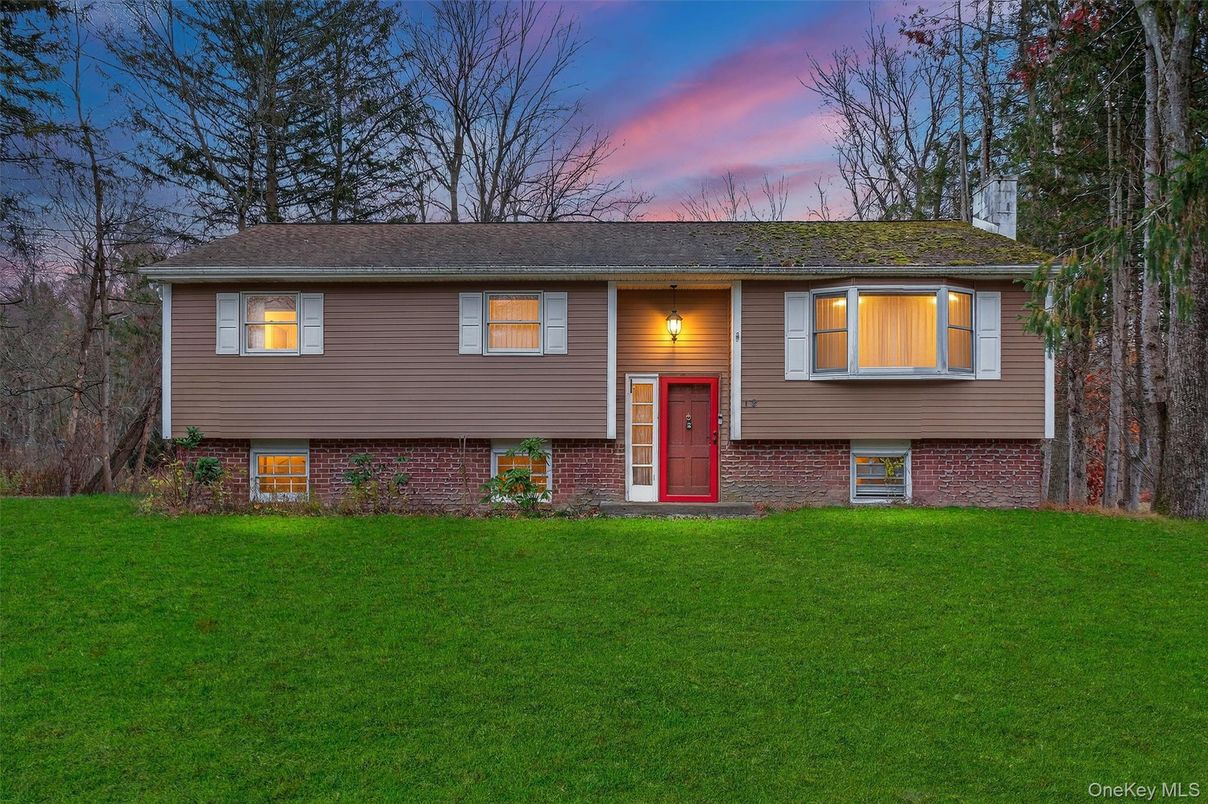 Exterior, Facade, Brick Facade, Raised Ranch