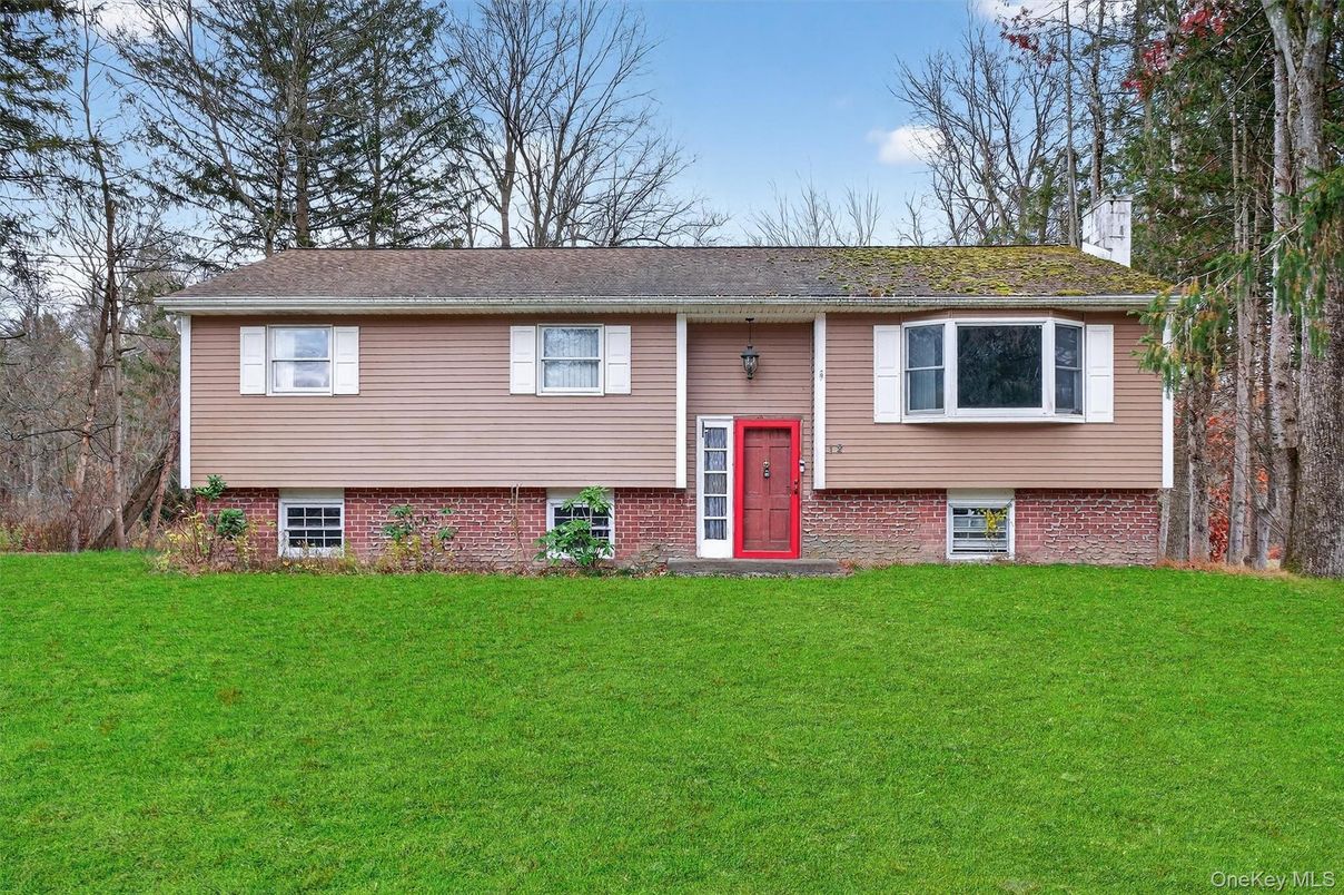 Exterior, Facade, Brick Facade, Raised Ranch