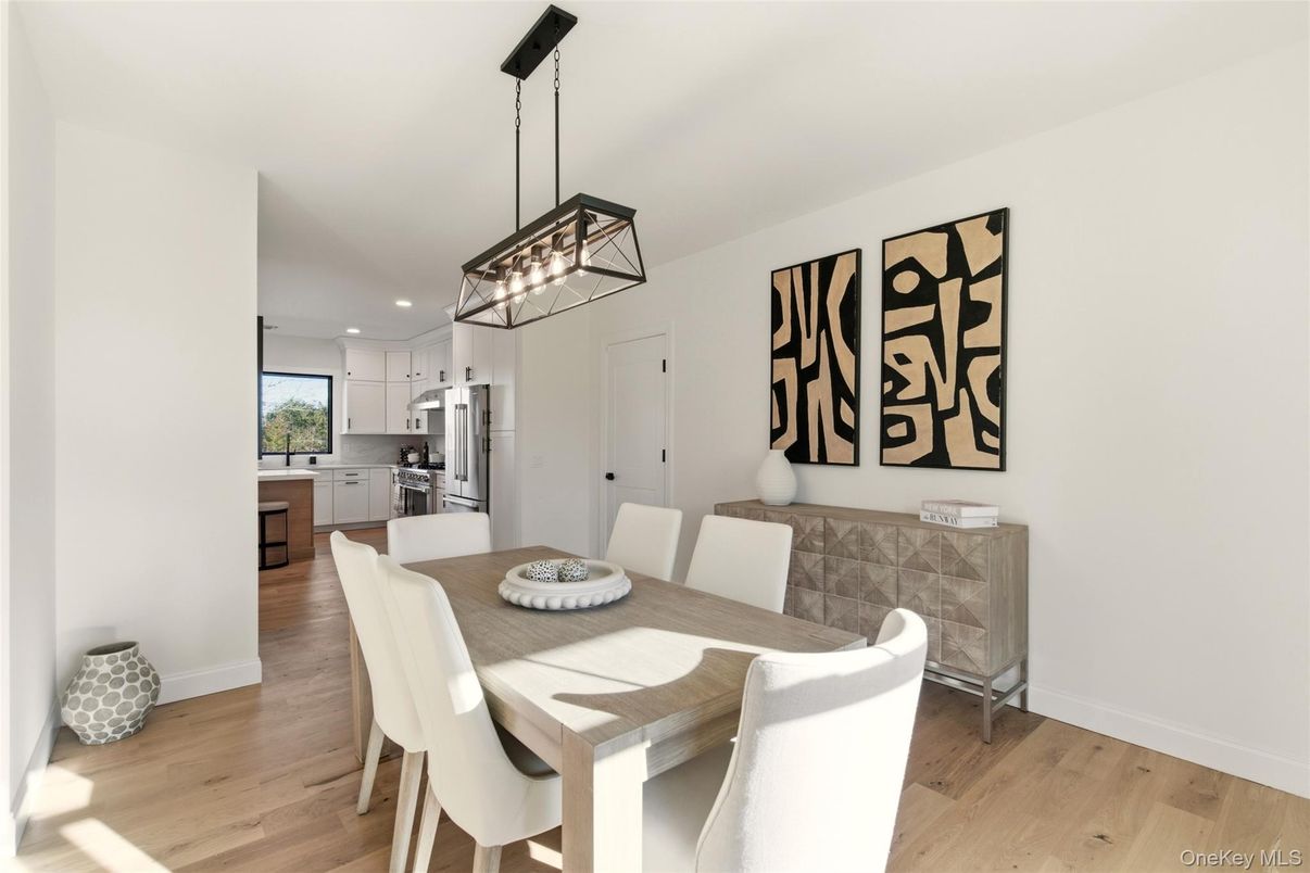 Dining room, Interior, Kitchen, Pendant Lights, Recessed Lighting, Stainless Steel Appliances, Wood Texture Flooring