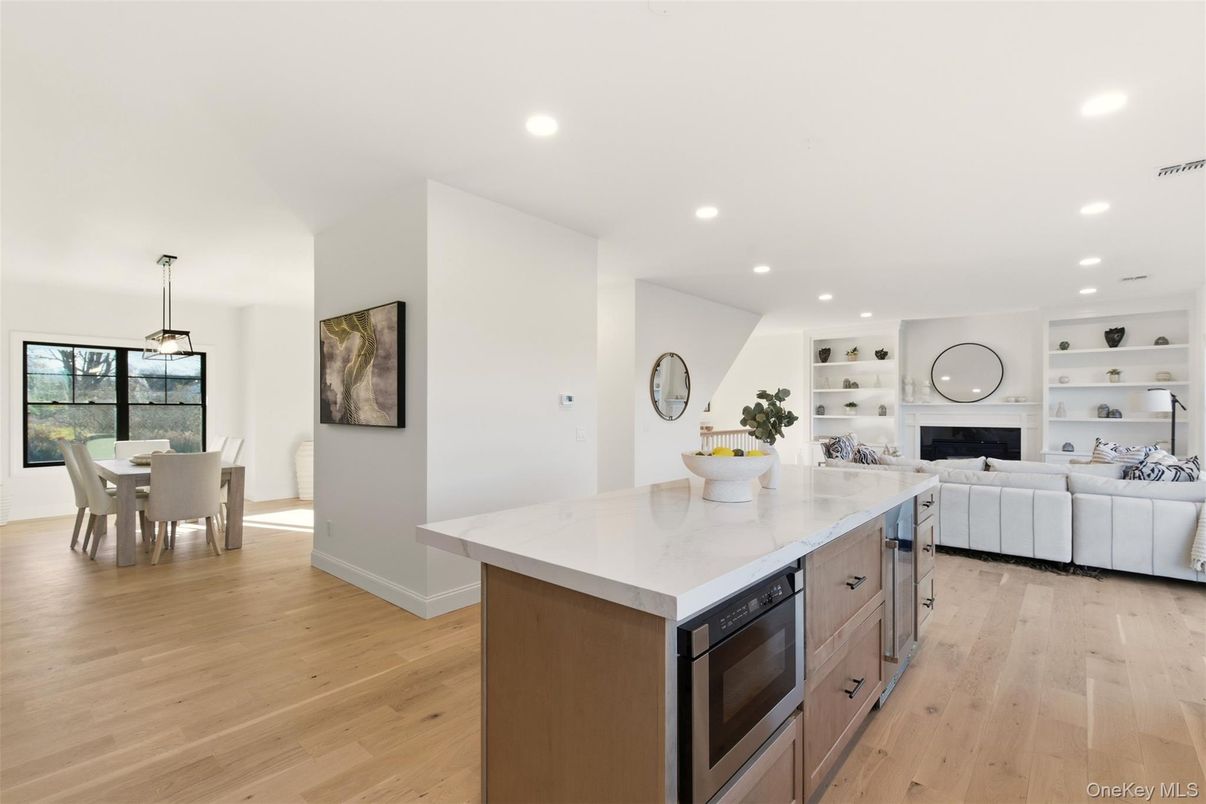 Dining room, Fireplace, Interior, Kitchen, Living room, Pendant Lights, Recessed Lighting, Wood Texture Flooring