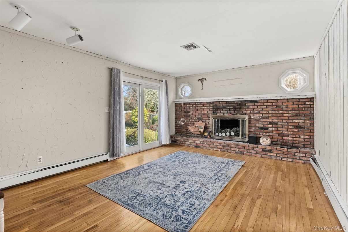 Empty room, Fireplace, Interior, Stone Walls, Wood Texture Flooring